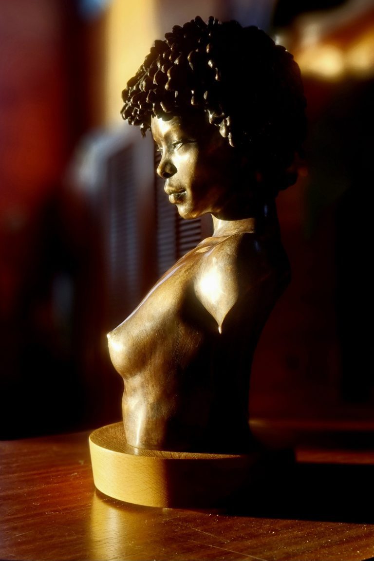 Bronze female torso